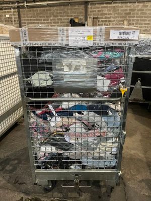 a cart with a lot of clothes in it