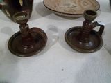 two cups and saucers sitting on a table