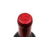 a bottle of wine that is sitting on a table