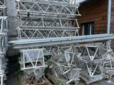 a lot of scaffolding on the side of a building