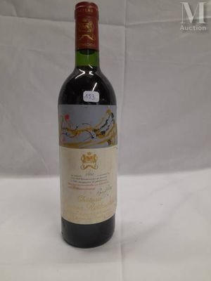 a bottle of wine that is sitting on a table