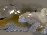 a close up of a piece of food that has been wrapped in plastic