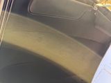 a picture of a car door handle and the door handle is open