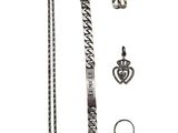 an image of a necklace, bracelet, and ring with a crown on it