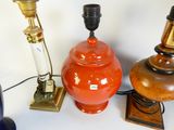 three lamps that are sitting next to each other on a table