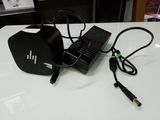 a charger that is sitting on a table next to a charger