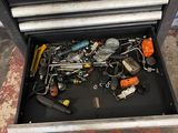a tool box with tools in it on the floor