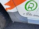 a close up of the side of a car with a sticker on it