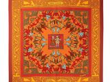 an orange and red square scarf with a picture of a man on a horse