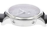 a close up of a watch on a white background