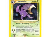 a close up of a pokemon card on a white surface