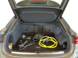 a trunk of a car with a bunch of cables in it