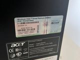 the back of a black box on a table with a barcode on it