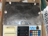a box with a digital scale in it on a table