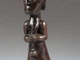 an image of a statue of a woman holding a baby