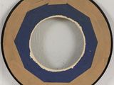 a picture of a circle made out of cardboard on the wall