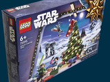 une boîte de Lego Star Wars posée près d'un sapin de Noël