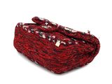 red and white knitted purse on a white background