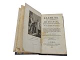 an old book with a picture of a woman on it