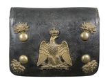 une image représentant une ceinture noire et dorée ornée d'un aigle