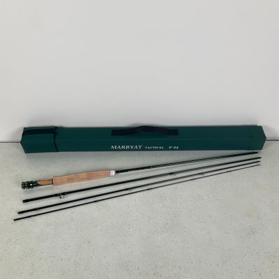 a set of three fly rods with a wooden handle and a green case