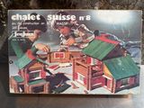 a box with a picture of a couple of people building a house