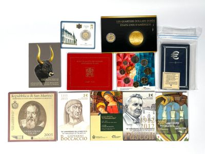 a lot of books and coins on a white surface