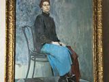 tableau représentant un homme assis sur une chaise, dans un cadre doré