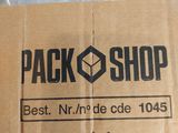 a cardboard box with a logo on it sitting on a table