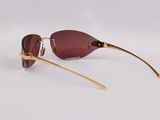 a pair of sunglasses on a white surface