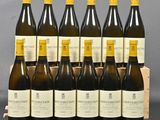 a bunch of bottles of wine sitting in a wooden crate
