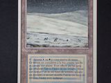 a close up of a card with a picture of a snowy landscape