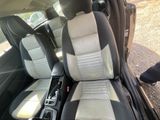 a picture of a black and white car with leather seats