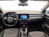a picture of the interior of a car with a touch screen