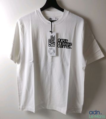 white t - shirt with black words on it hanging on a hanger