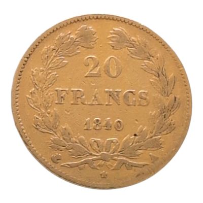 gros plan d'une pièce de monnaie sur fond blanc