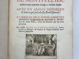 an open book with a picture of a man sitting on a bench