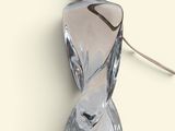 an image of a perfume bottle on a white surface