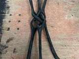 a pair of pliers on a piece of wood