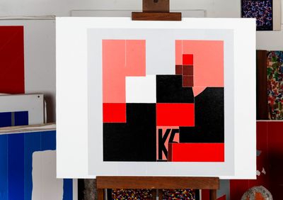 a picture of a painting on a easel in a room