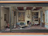 une maquette d'une pièce avec des tableaux accrochés aux murs