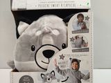 the box is open to show the contents of a stuffed animal