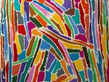 une peinture représentant une œuvre abstraite colorée sur un mur blanc