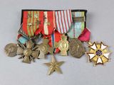 many medals and medals that are on the table
