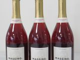 three bottles of wine sitting on top of a table next to each other