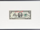 a framed picture of a $ 10 bill with a signature on it