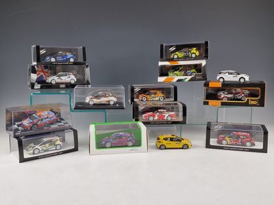 many different models of cars in a display case