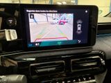 a picture of a car dashboard with a gps device on it