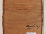 a close up of a picture of a piece of wood with writing on it