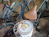 a blue bicycle with a basket on the back of it
